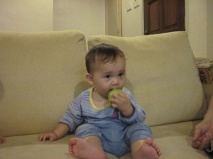 Trying to have an apple by himself